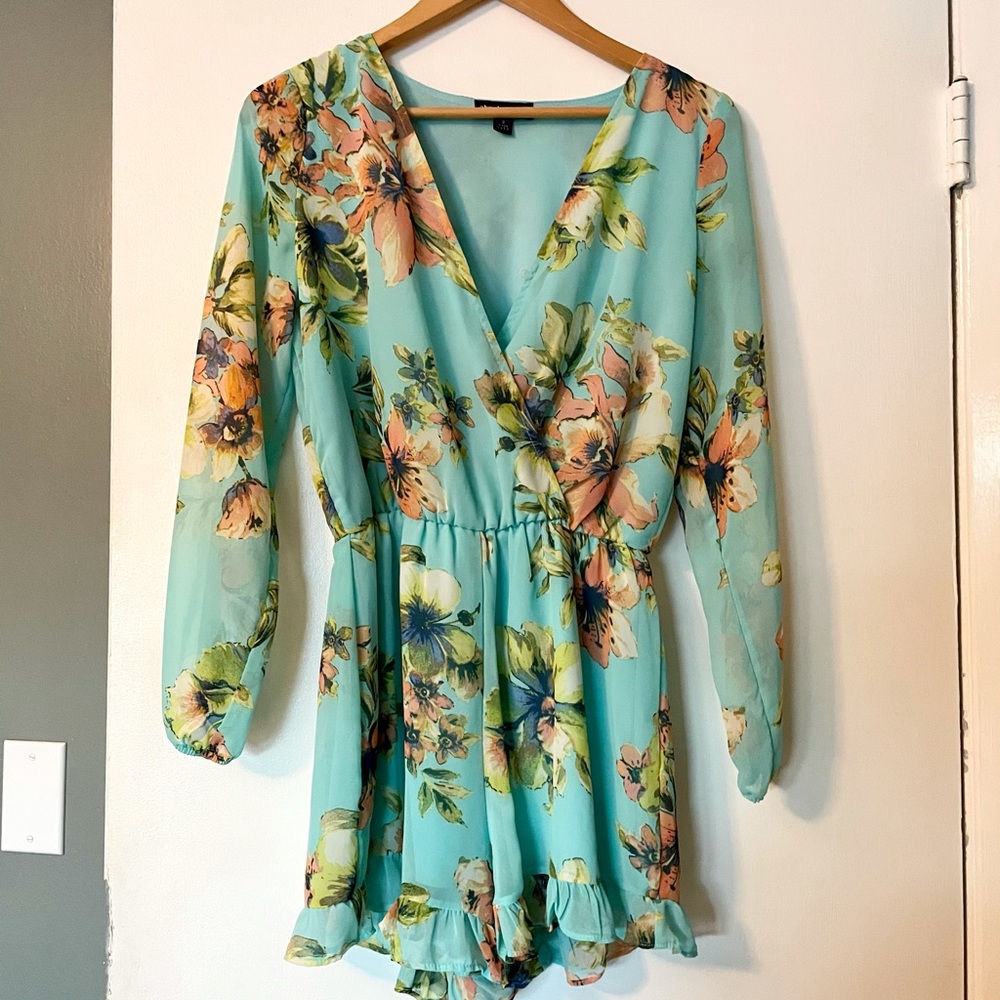 Beautiful About A Girl romper with a button at the chest area